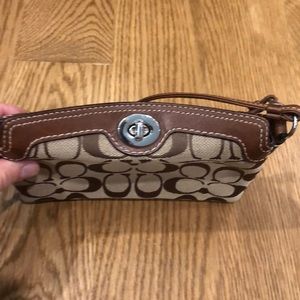 Coach wristlet with extra room